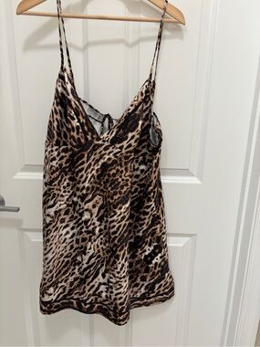 Vintage Fredrick’s of Hollywood leopard open back teddy 
(size XL). ￼